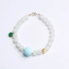 A single-loop bracelet made of white jade and Hetian jade, 999 gold coins, turquoise, meander beads, hanging dry green, and peace pendant for women Specification image